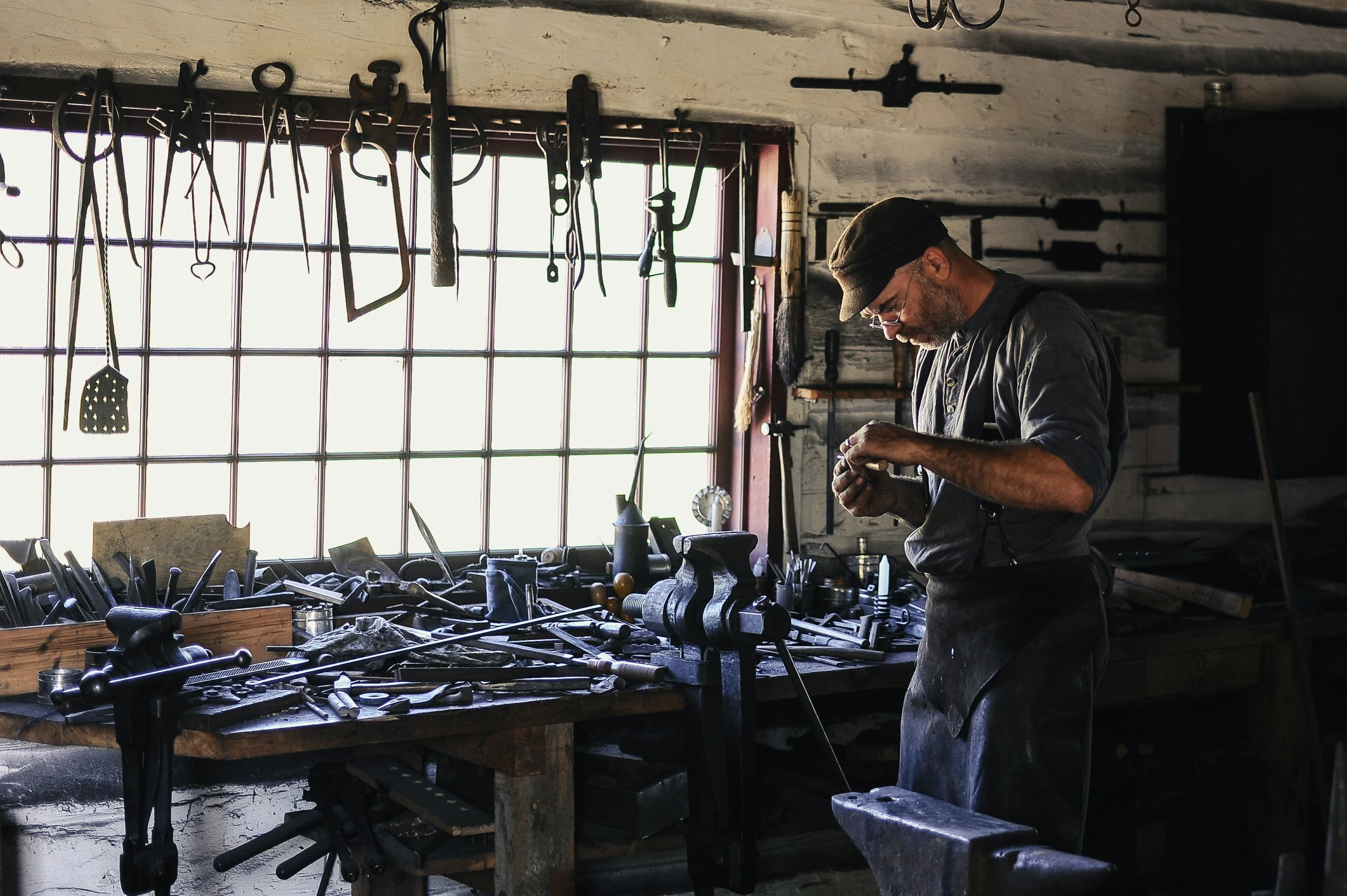 Tradesman working in a tool shed